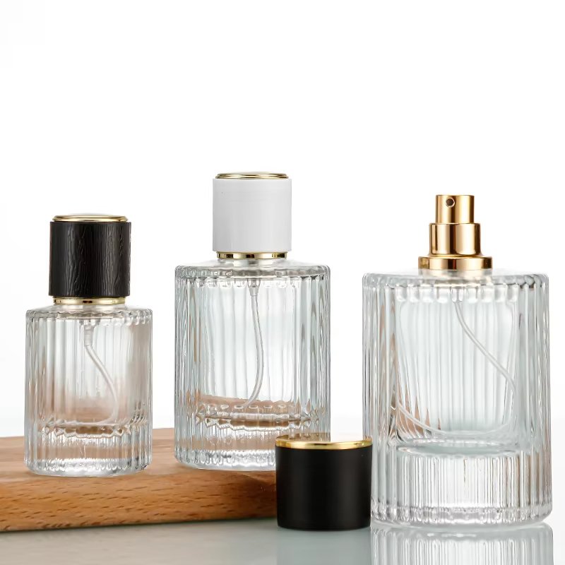 30ml & 50ml clear glass perfume bottles, striped thick-bottomed luxury perfume spray bottles, empty perfume bottles, and customizable logos are available.