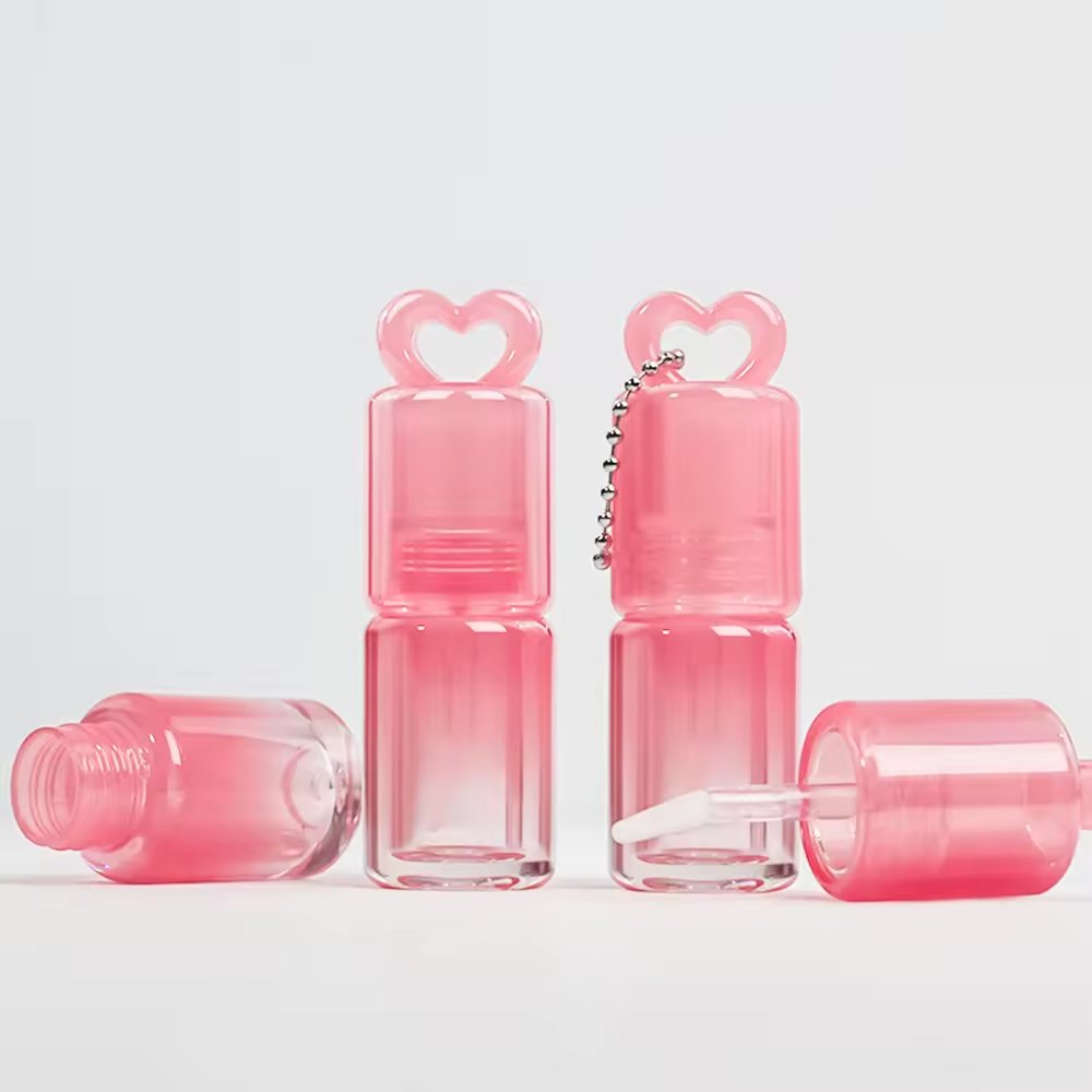 3.4ml Heart-Shaped Gradient Pink Lip Gloss Tube, Mini Empty Plastic Lip Gloss Cosmetic Packaging Tube with Chain and Slim Handle